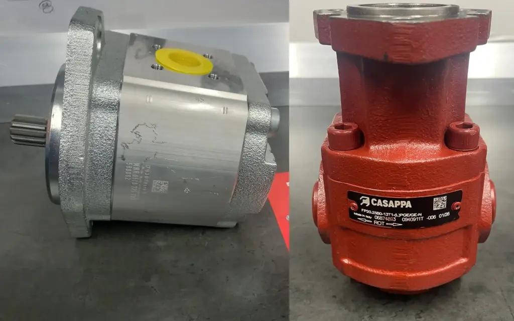 Două pompe cu roți dințate: Bosch Rexroth 0 510 725 193 (argintie, stânga) și Casappa FP20.25B0 (roșie, dreapta)